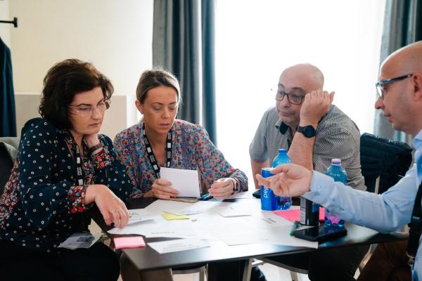 people working around a table